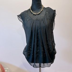 Blacktop with gold sequin underlay